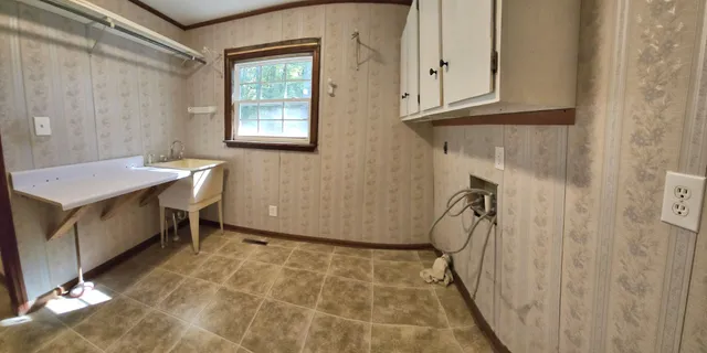 a bathroom with a sink and a bathtub