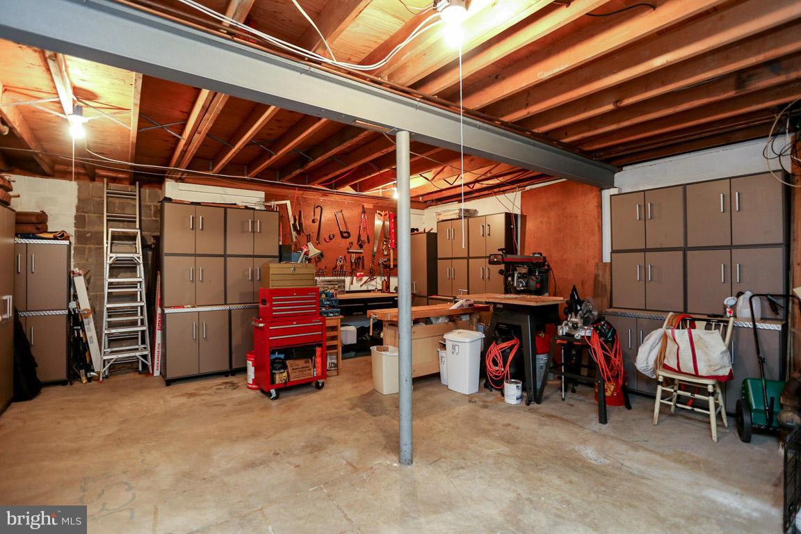 9247 Log Chain Road Columbia, MD 21045 - Photo 22 of 30 Basement workshop (cabinets negotiable)