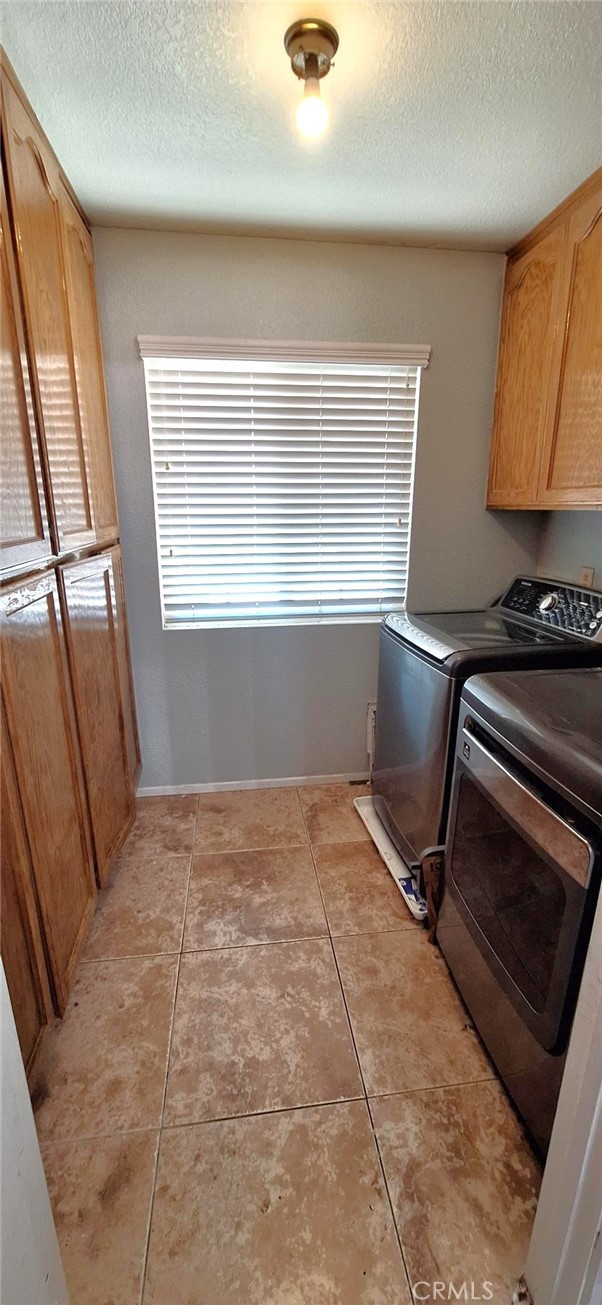 14822 Crofton Lane Helendale, CA 92342 - Photo 16 of 33 a view of a room with wooden floor and windows