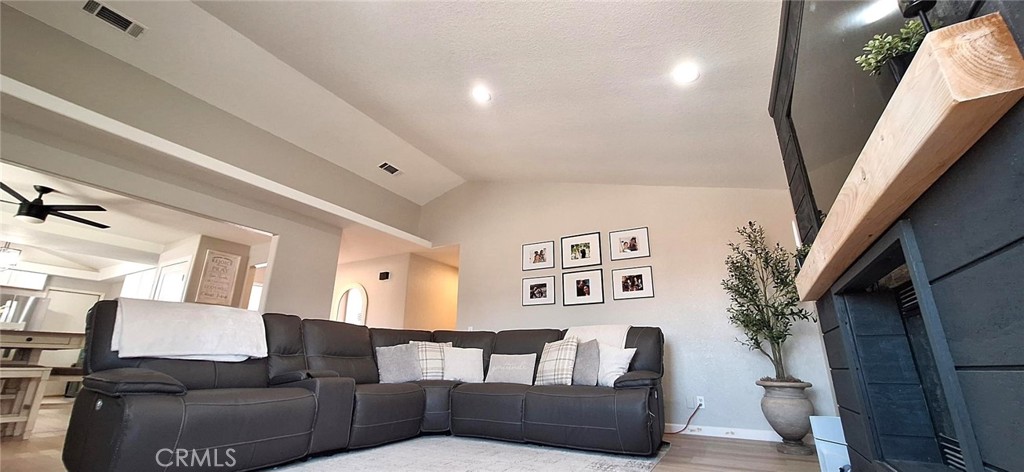 14822 Crofton Lane Helendale, CA 92342 - Photo 9 of 33 a living room with furniture and wooden floor