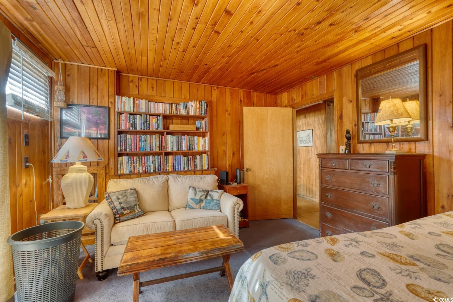 350 Underwood Drive Murrells Inlet, SC 29576 - Photo 24 of 36 Carpeted bedroom featuring wooden walls and wooden ceiling