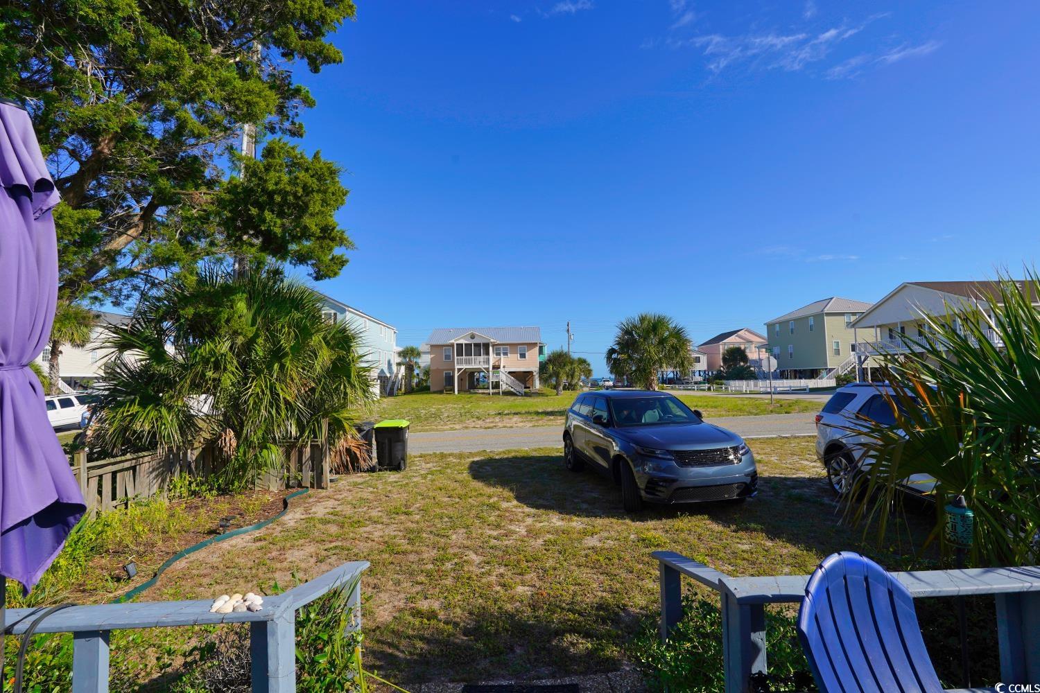 350 Underwood Drive Murrells Inlet, SC 29576 - Photo 36 of 36 View of grassy yard featuring a residential view