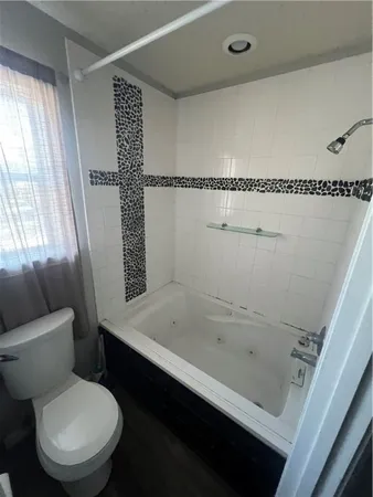 a bathroom with a sink and a toilet