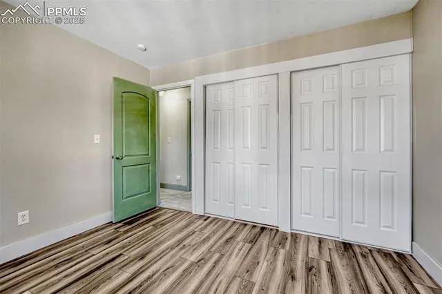 a view of a hallway with washer and dryer