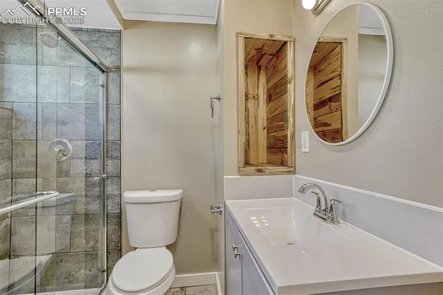 a view of a bathroom with a sink and mirror