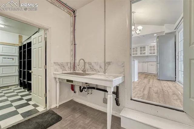 a view of a door and a window