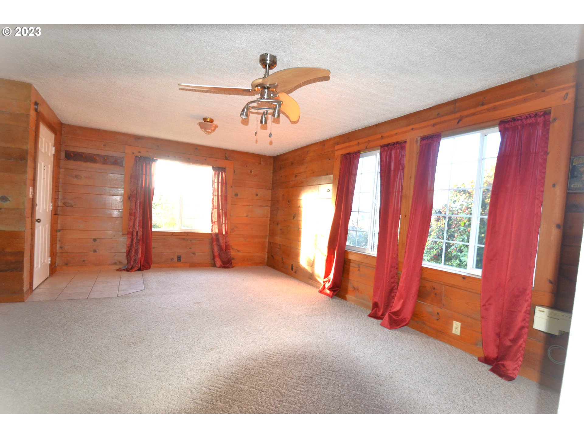 1985 Roseburg Road Myrtle Point, OR 97458 - Photo 4 of 29 a view of an empty room with a window