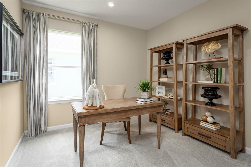 2313 Scenic Pk Loop Wimauma, FL 33598 - Photo 18 of 19 a workspace with furniture and a window