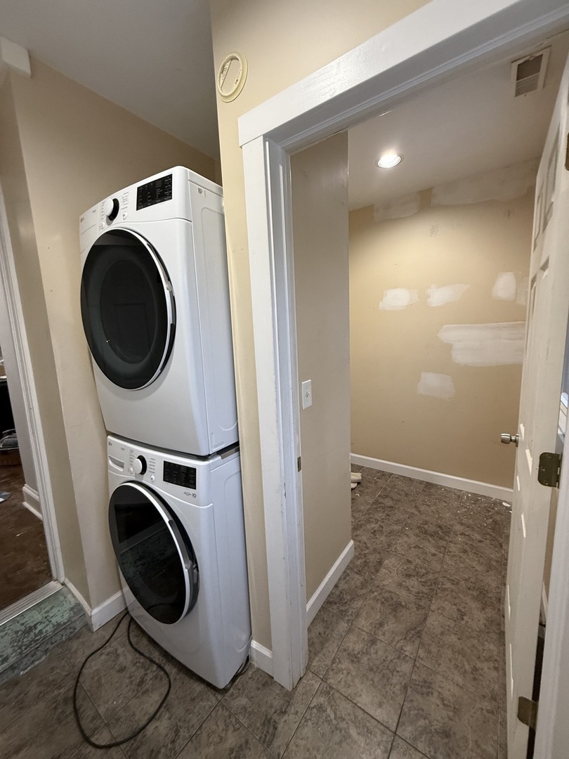 3252 West Crystal Street, Unit 2 Chicago, IL 60651 - Photo 12 of 13 a view of a storage & utility room with washer and dryer