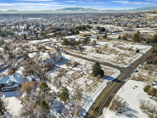 1540 Cherrypoint Lane, Unit 7 Alpine, UT 84004 - Photo 6 of 9 Snowy aerial view featuring a mountain view