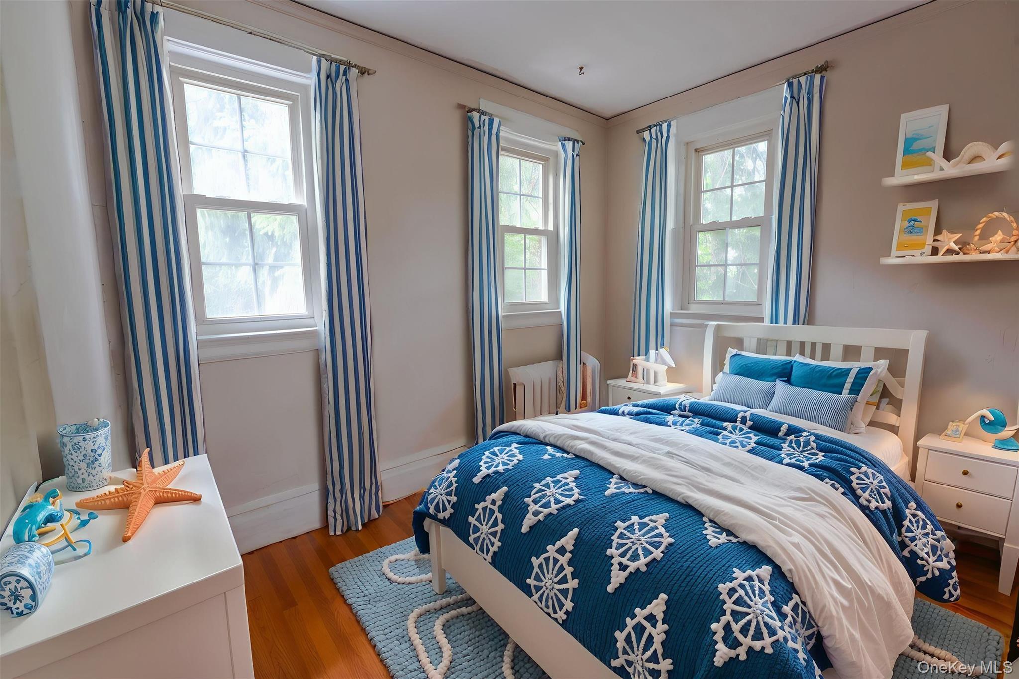 26 Overlook Circle New Rochelle, NY 10804 - Photo 12 of 15 a bedroom with a bed and a window