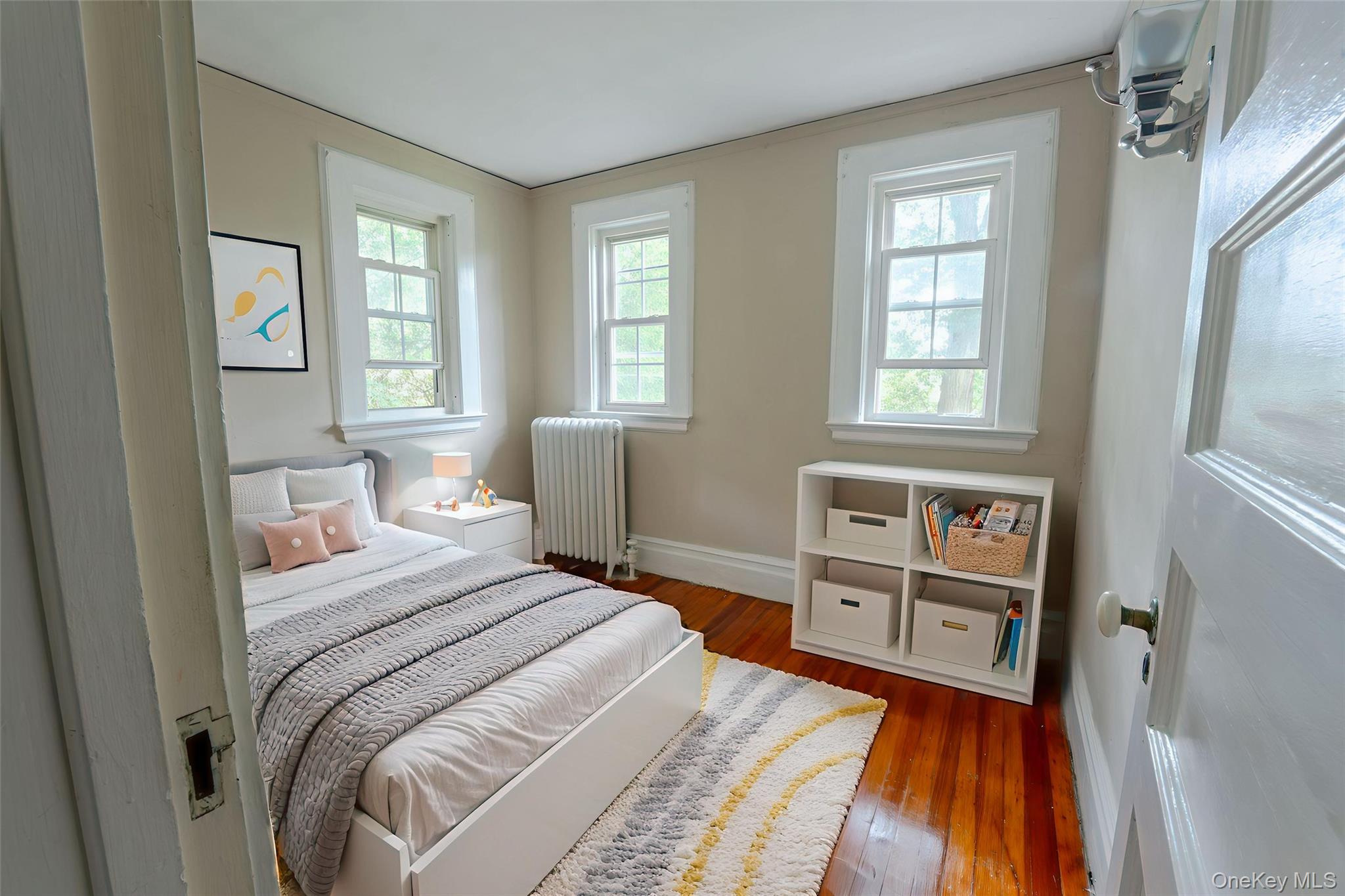 26 Overlook Circle New Rochelle, NY 10804 - Photo 13 of 15 a bedroom with a bed and a window