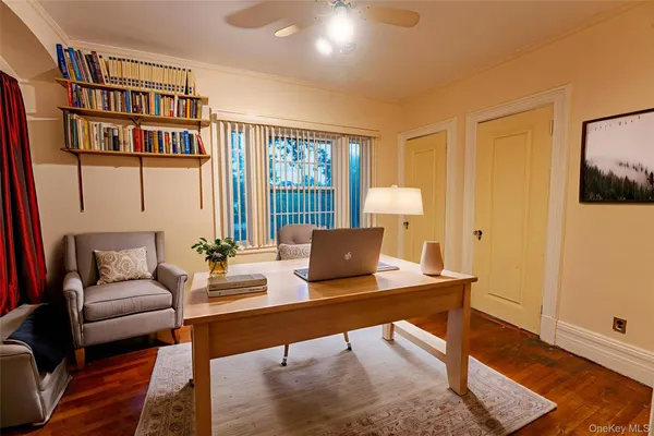 a living room with furniture or couch and a fireplace