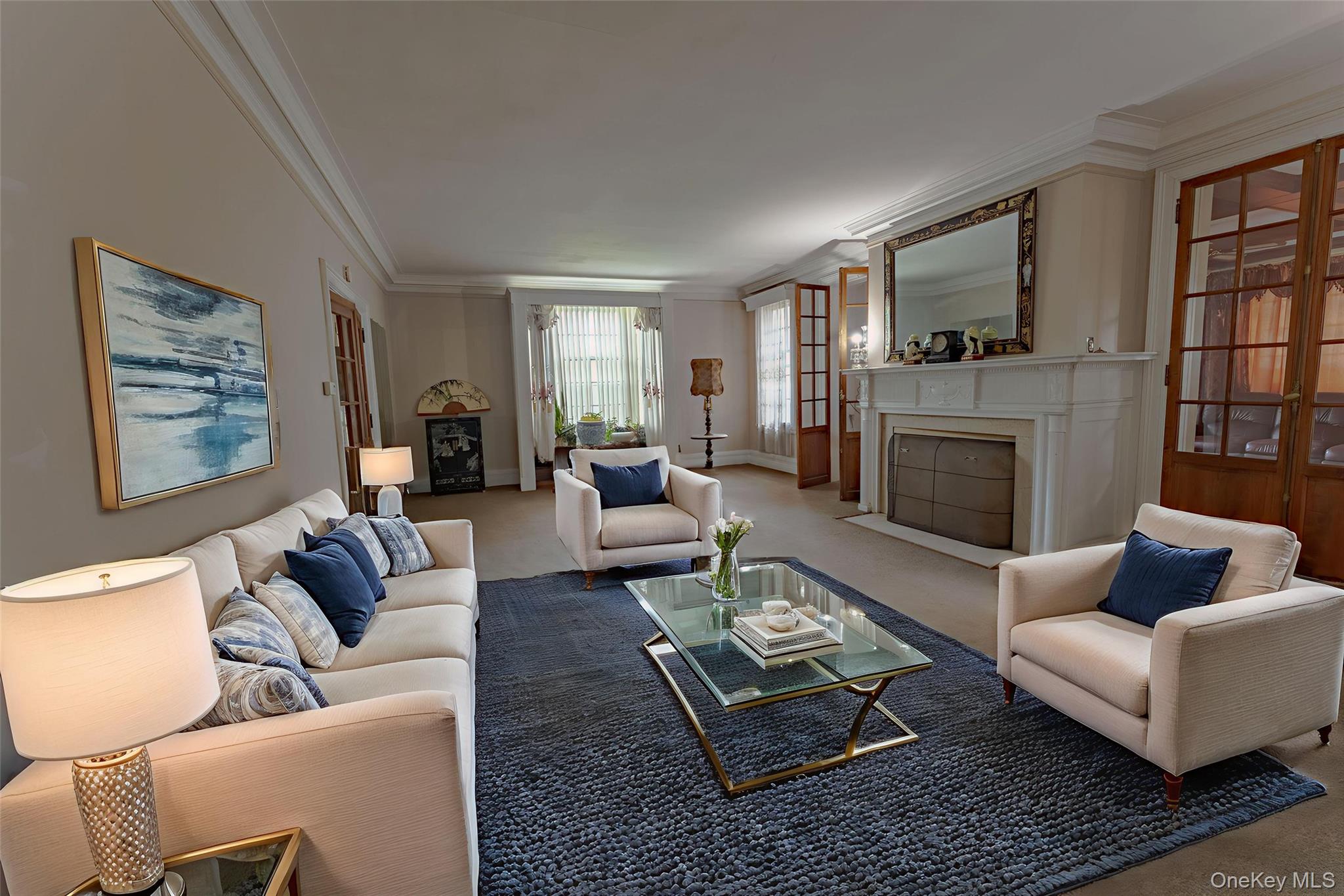 26 Overlook Circle New Rochelle, NY 10804 - Photo 9 of 15 a living room with furniture or couch and a fireplace