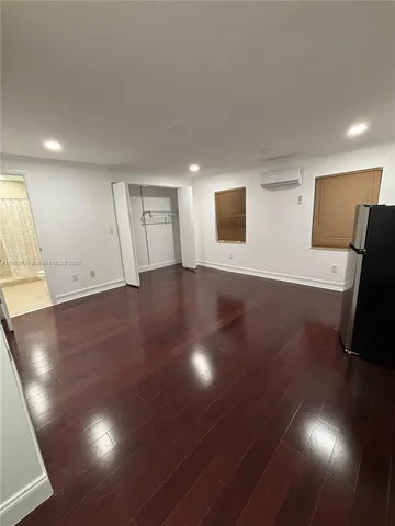 a view of livingroom with furniture and wooden floor