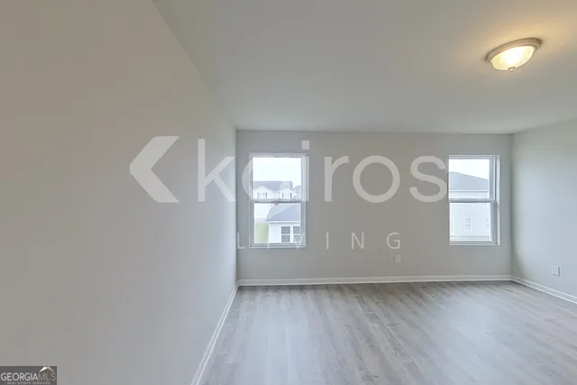 an empty room with windows