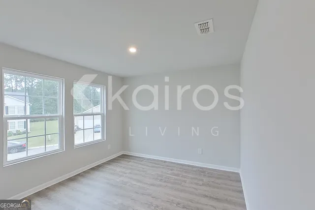 an empty room with windows