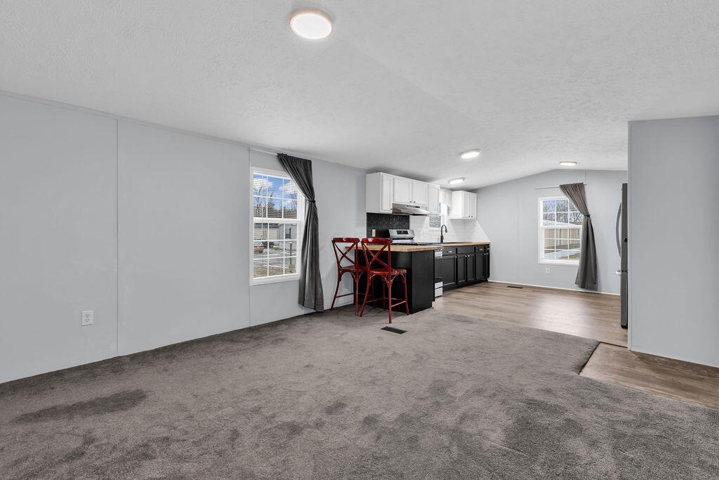8764 National Road Southwest, Unit 106 Etna, OH 43062 - Photo 6 of 28 Living Room and Kitchen