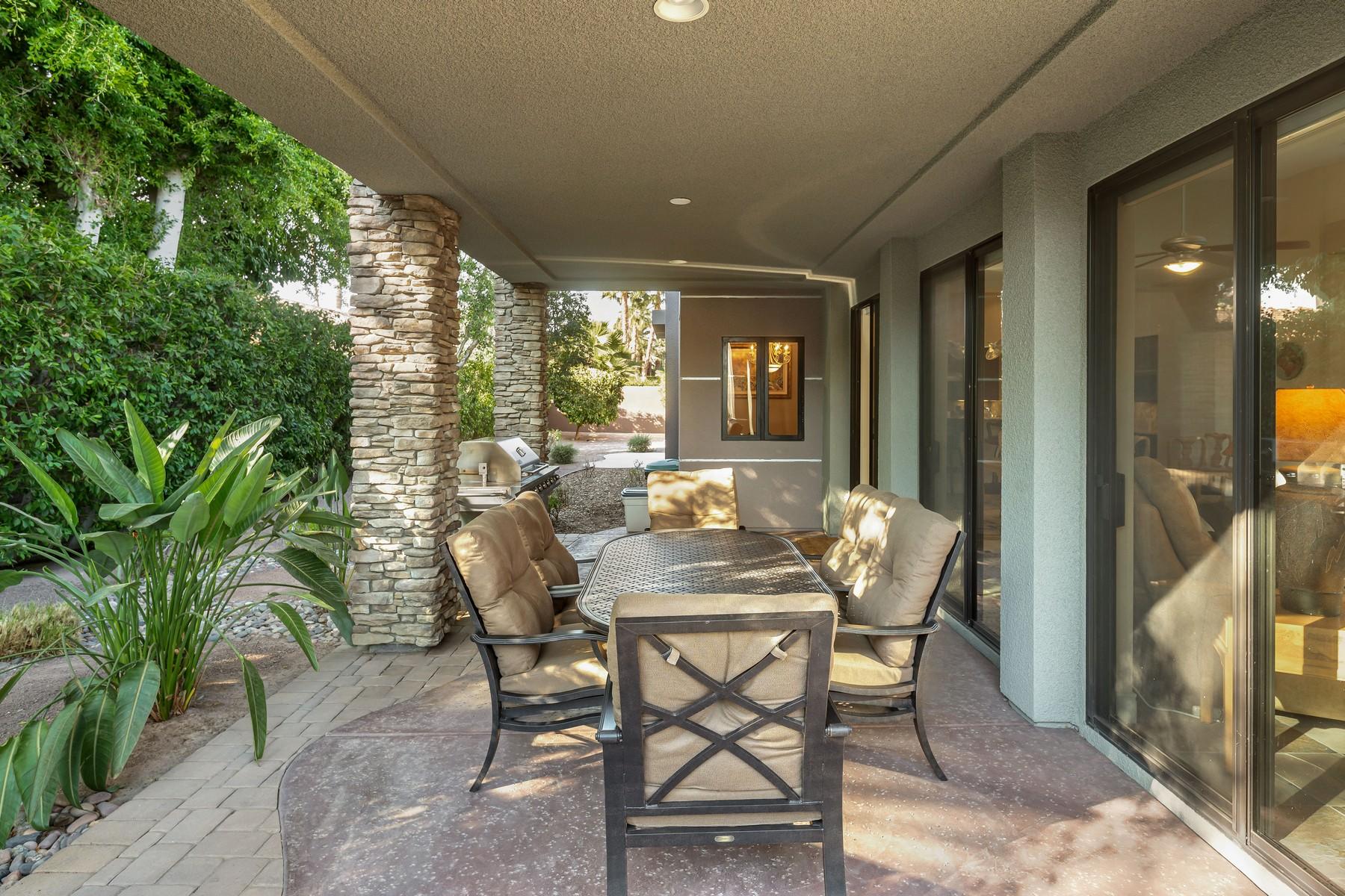 12 Dominion Court Rancho Mirage, CA 92270 - Photo 15 of 44 a view of a dining room with furniture and window