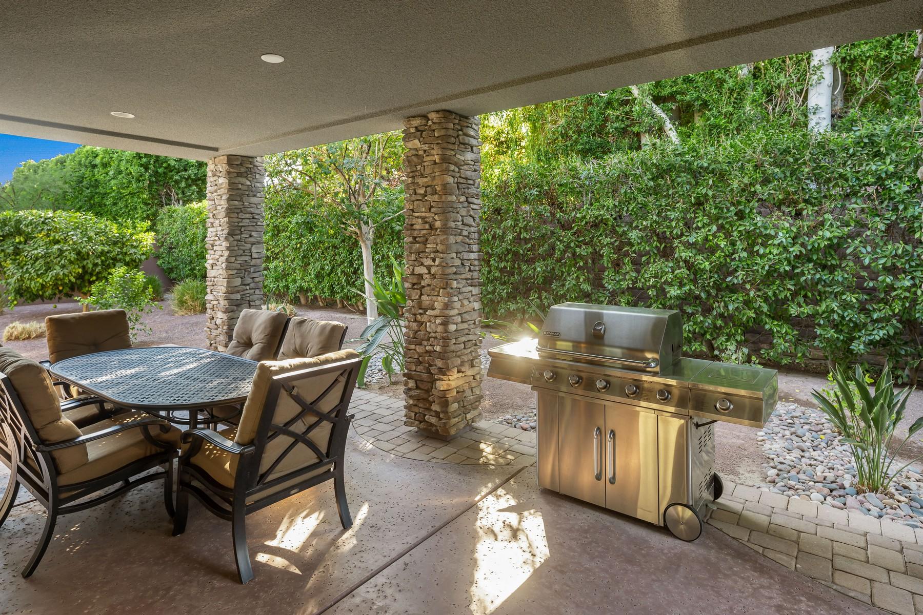 12 Dominion Court Rancho Mirage, CA 92270 - Photo 16 of 44 a outdoor dining space with furniture and outdoor view