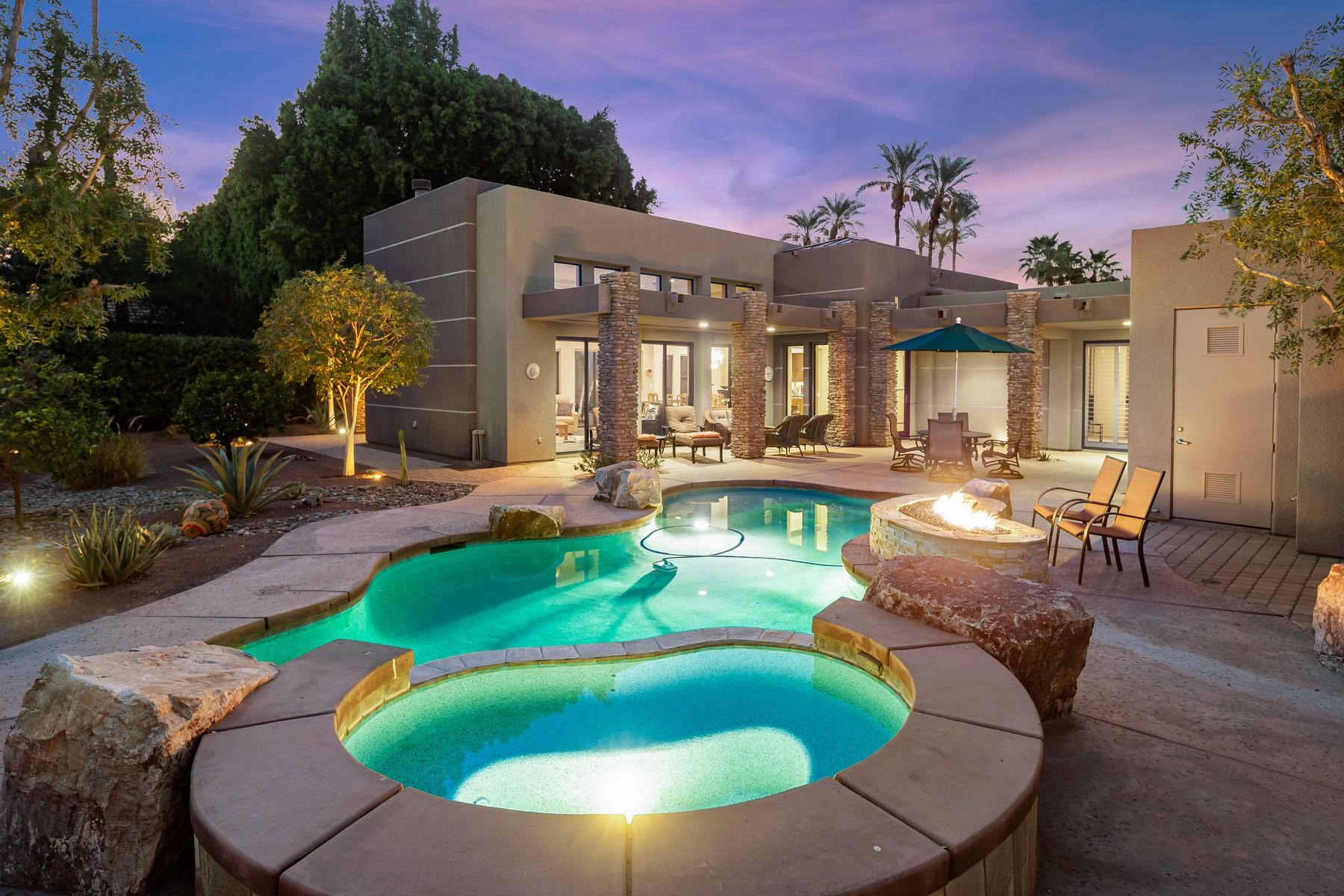 12 Dominion Court Rancho Mirage, CA 92270 - Photo 3 of 44 a view of a house with swimming pool and porch with furniture