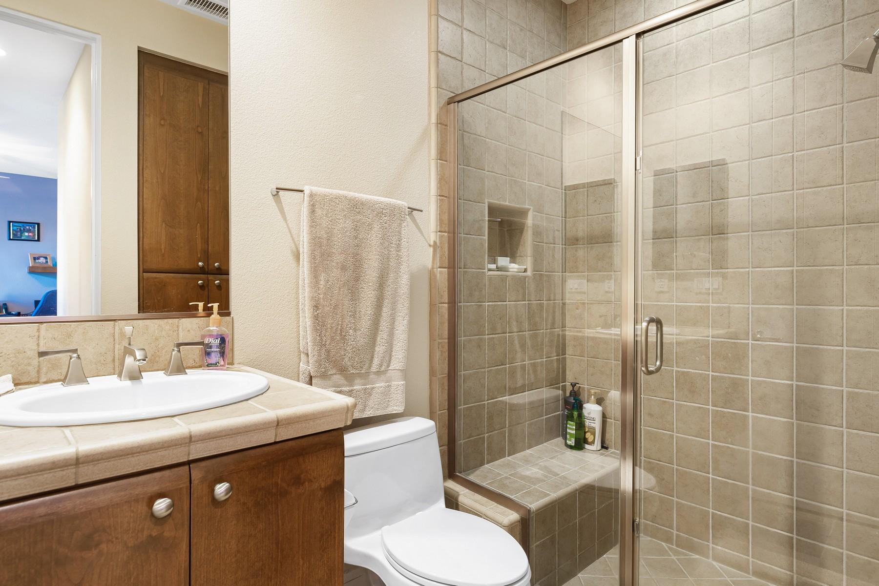 12 Dominion Court Rancho Mirage, CA 92270 - Photo 24 of 44 a bathroom with a sink toilet and shower