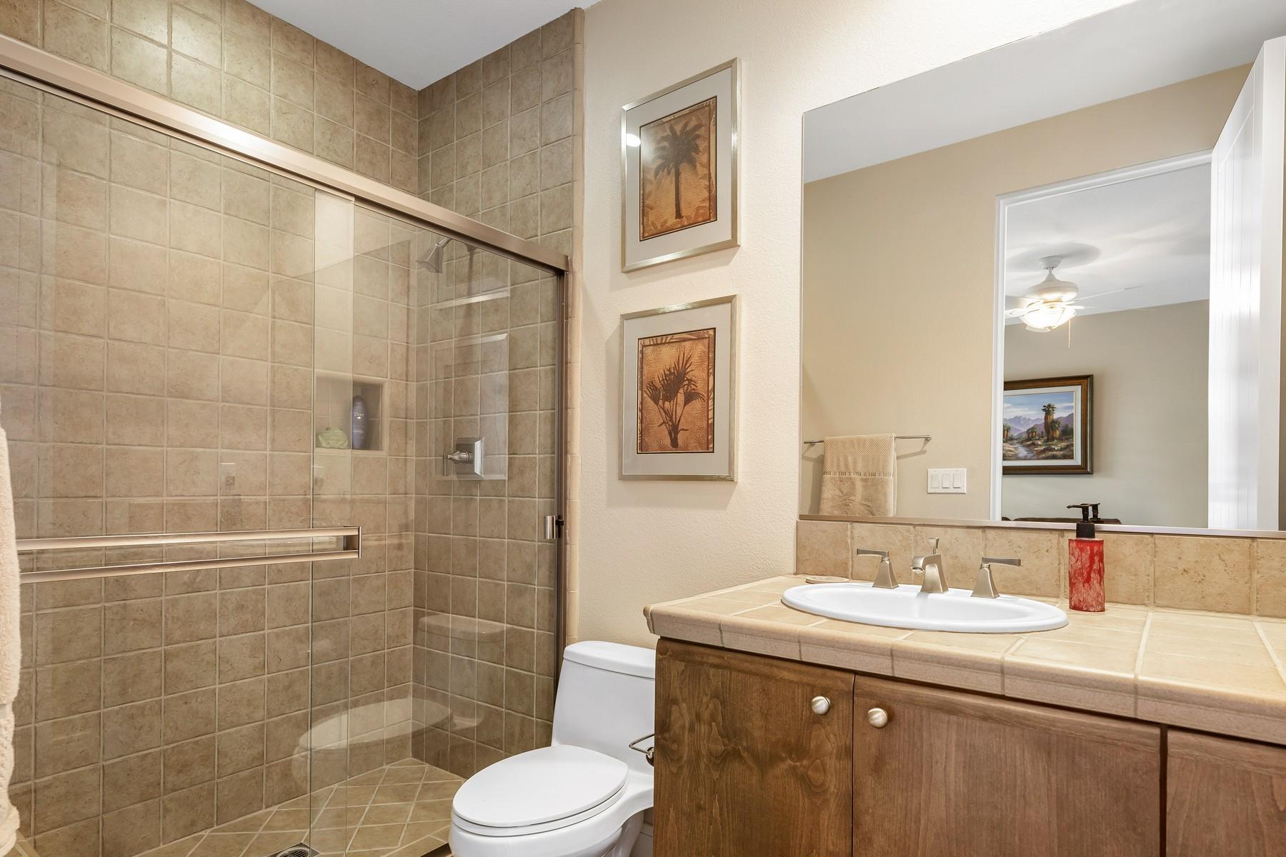 12 Dominion Court Rancho Mirage, CA 92270 - Photo 26 of 44 a bathroom with a sink a toilet and shower