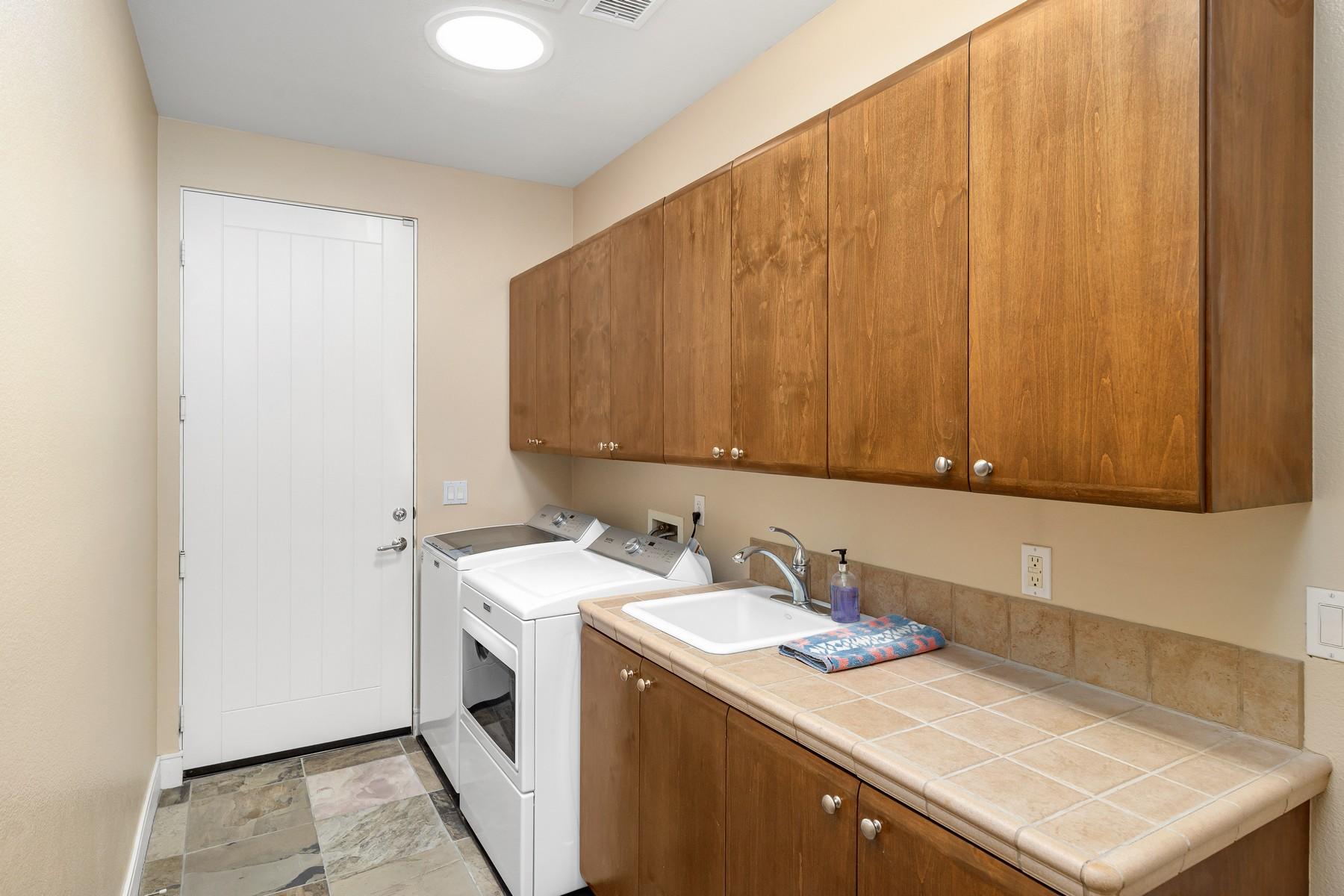 12 Dominion Court Rancho Mirage, CA 92270 - Photo 27 of 44 a bathroom with a sink and a mirror