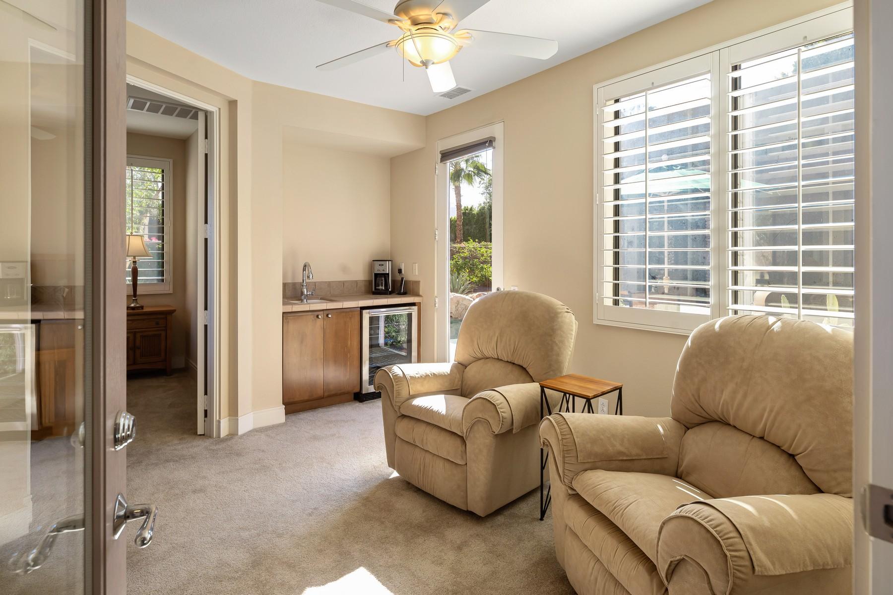 12 Dominion Court Rancho Mirage, CA 92270 - Photo 29 of 44 a living room with furniture and a large window