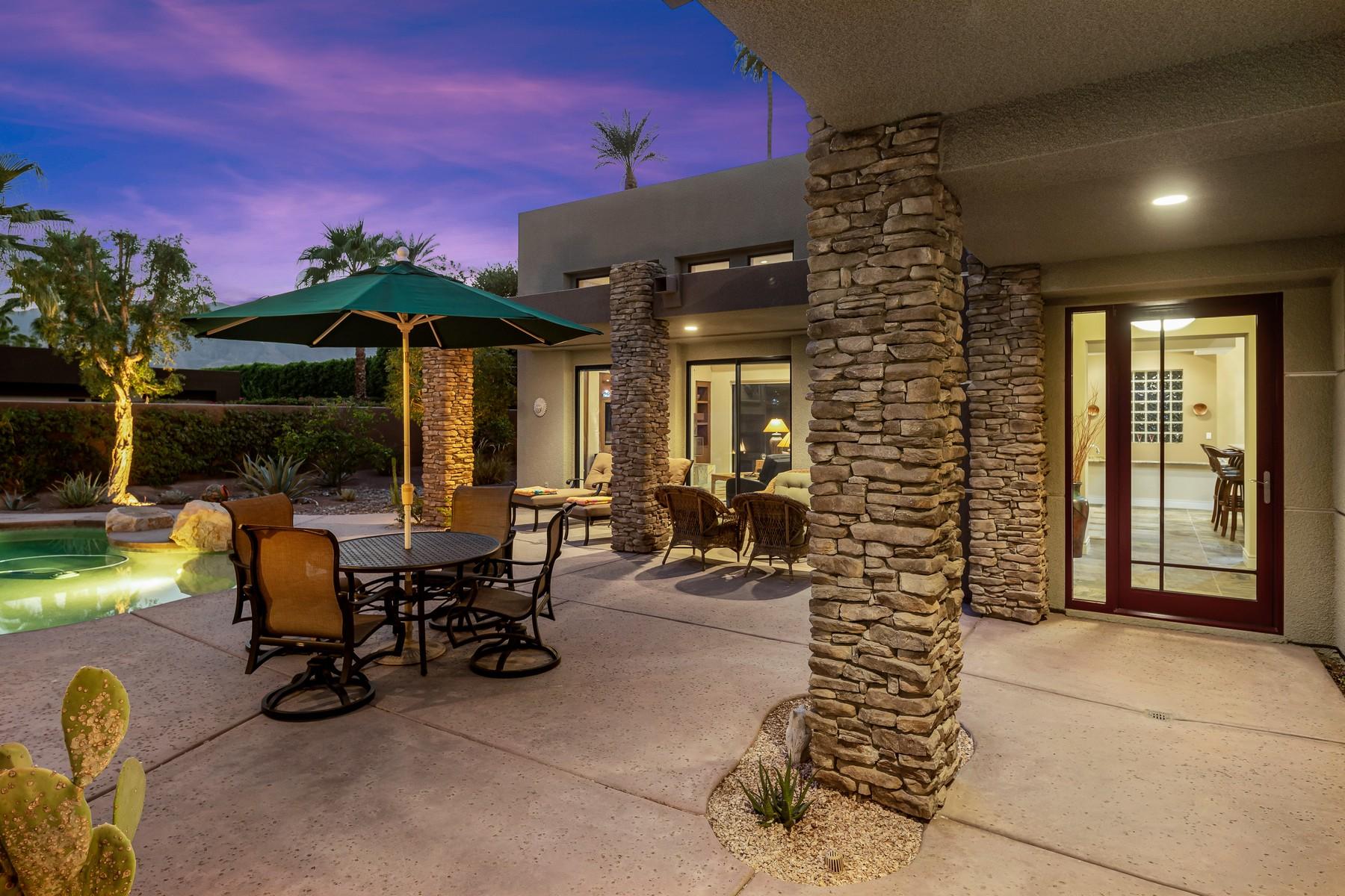 12 Dominion Court Rancho Mirage, CA 92270 - Photo 4 of 44 a view of a patio with table and chairs and potted plants
