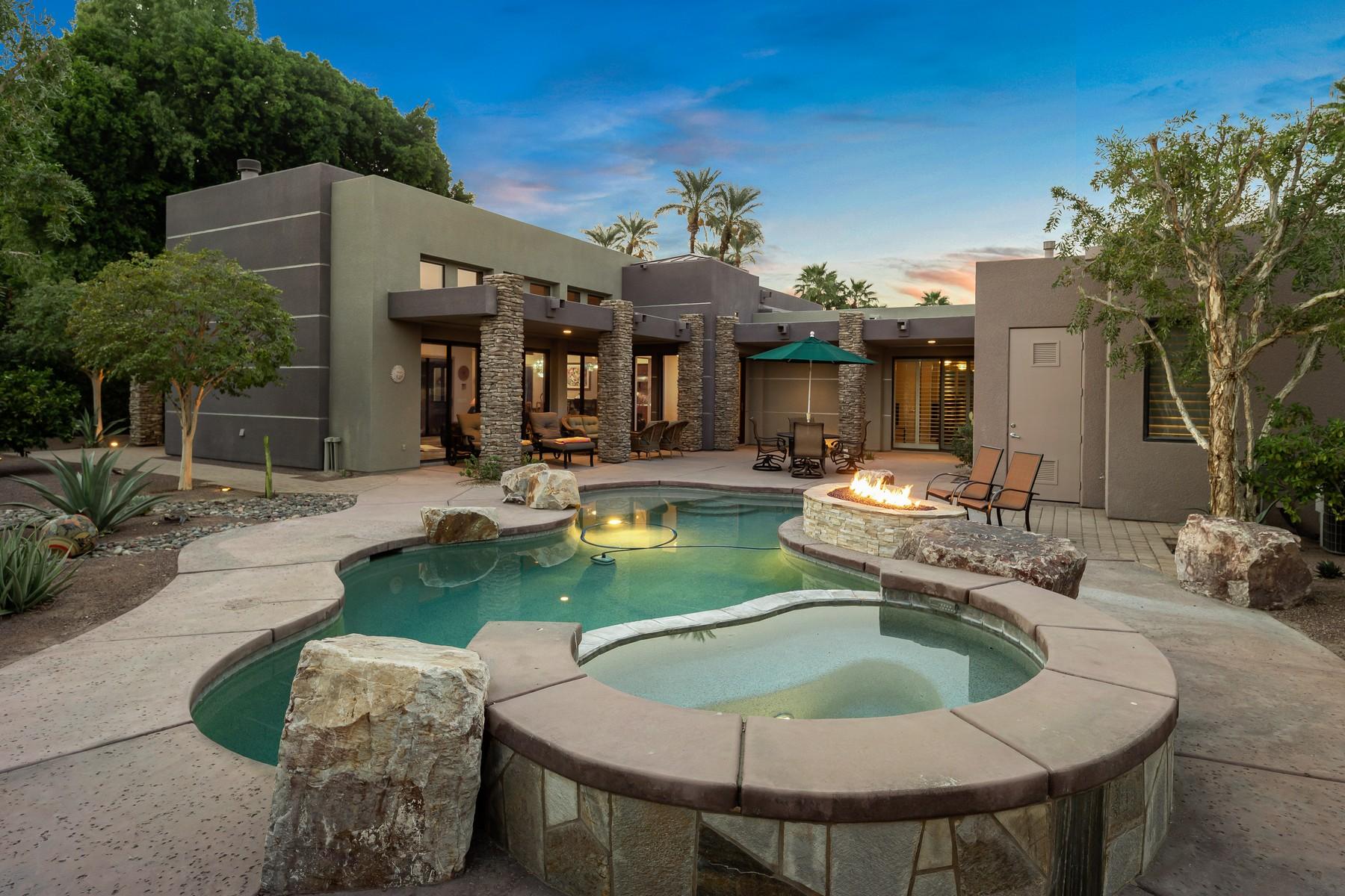 12 Dominion Court Rancho Mirage, CA 92270 - Photo 33 of 44 a view of a house with backyard and sitting area
