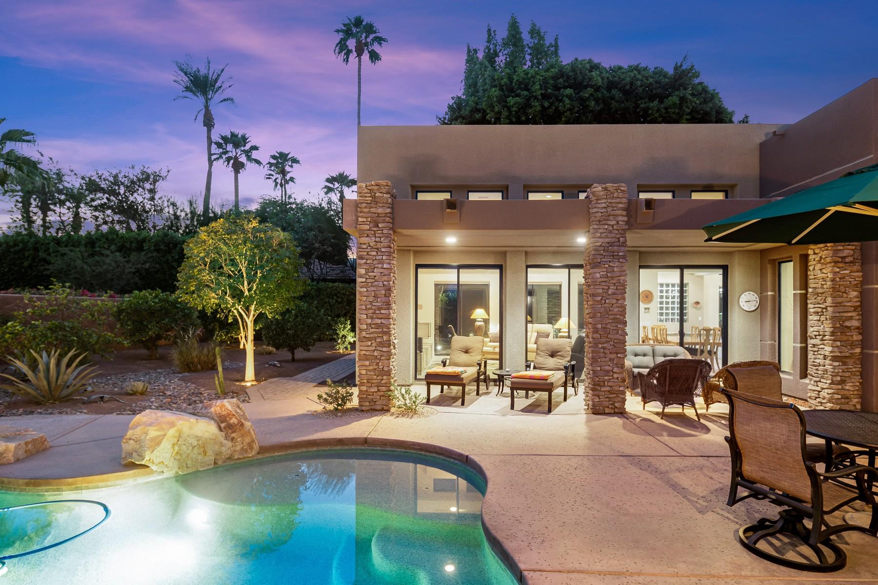 12 Dominion Court Rancho Mirage, CA 92270 - Photo 39 of 44 a view of a swimming pool with outdoor seating