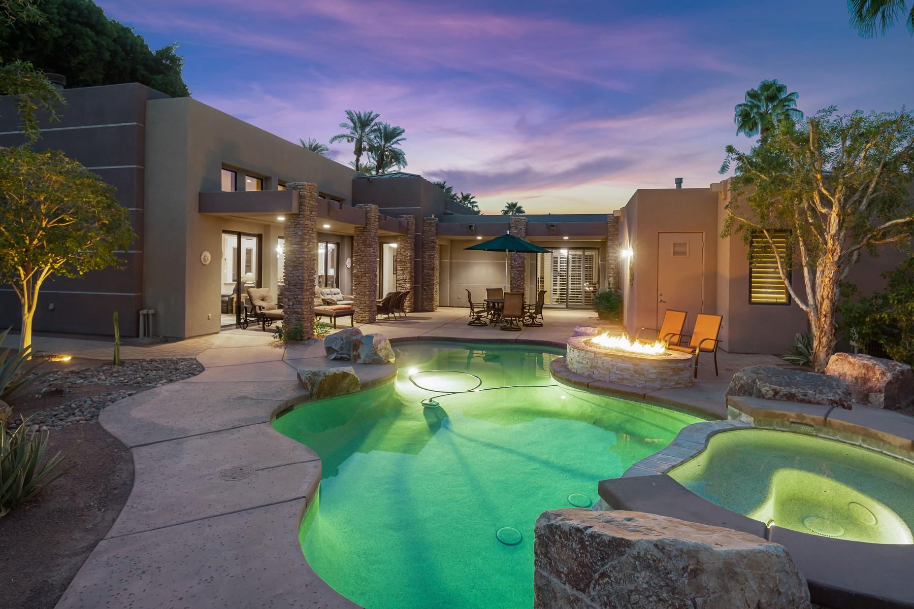 12 Dominion Court Rancho Mirage, CA 92270 - Photo 41 of 44 a view of a house with swimming pool and sitting area