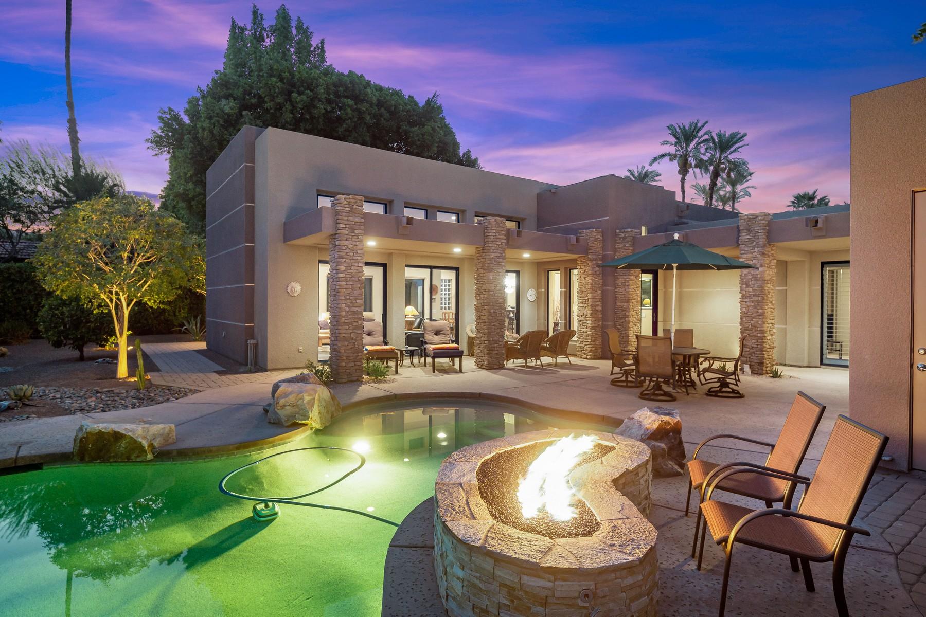12 Dominion Court Rancho Mirage, CA 92270 - Photo 42 of 44 a view of a house with swimming pool and sitting area