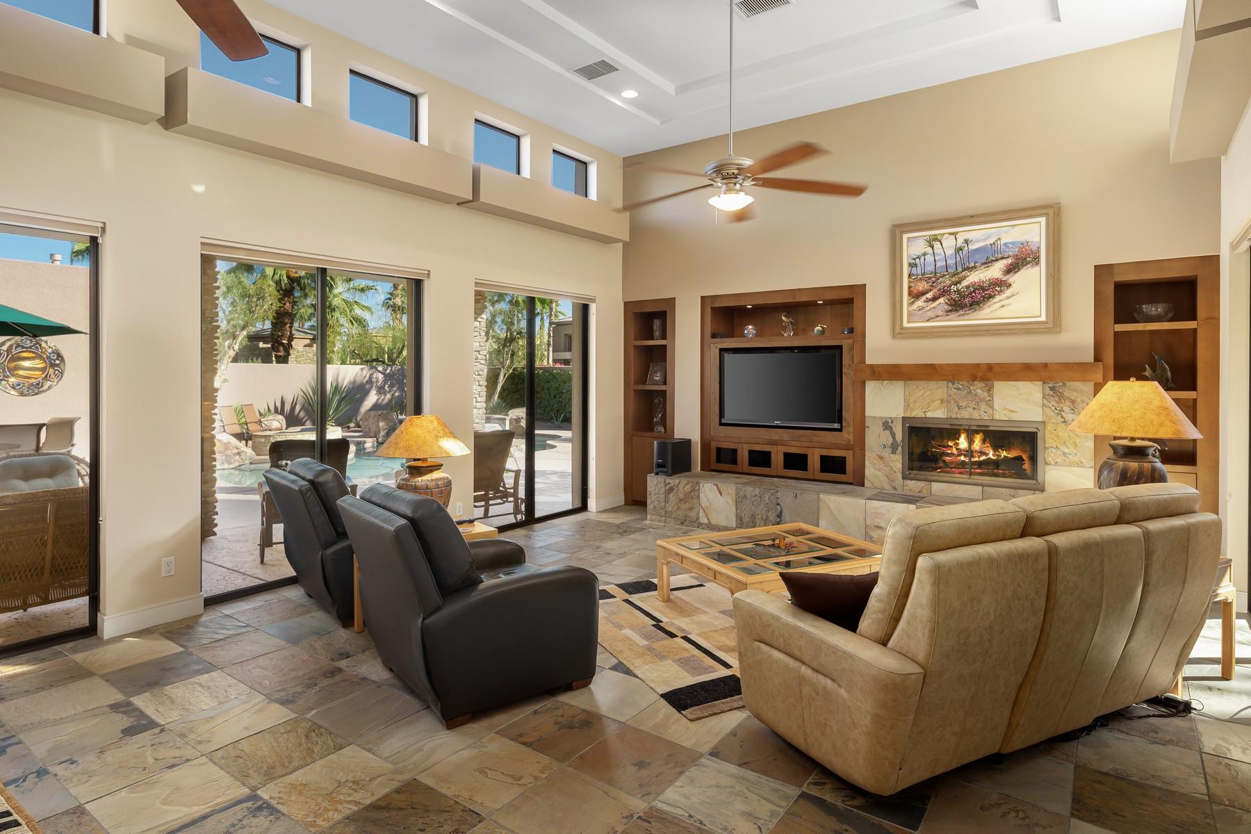 12 Dominion Court Rancho Mirage, CA 92270 - Photo 6 of 44 a living room with furniture and a flat screen tv