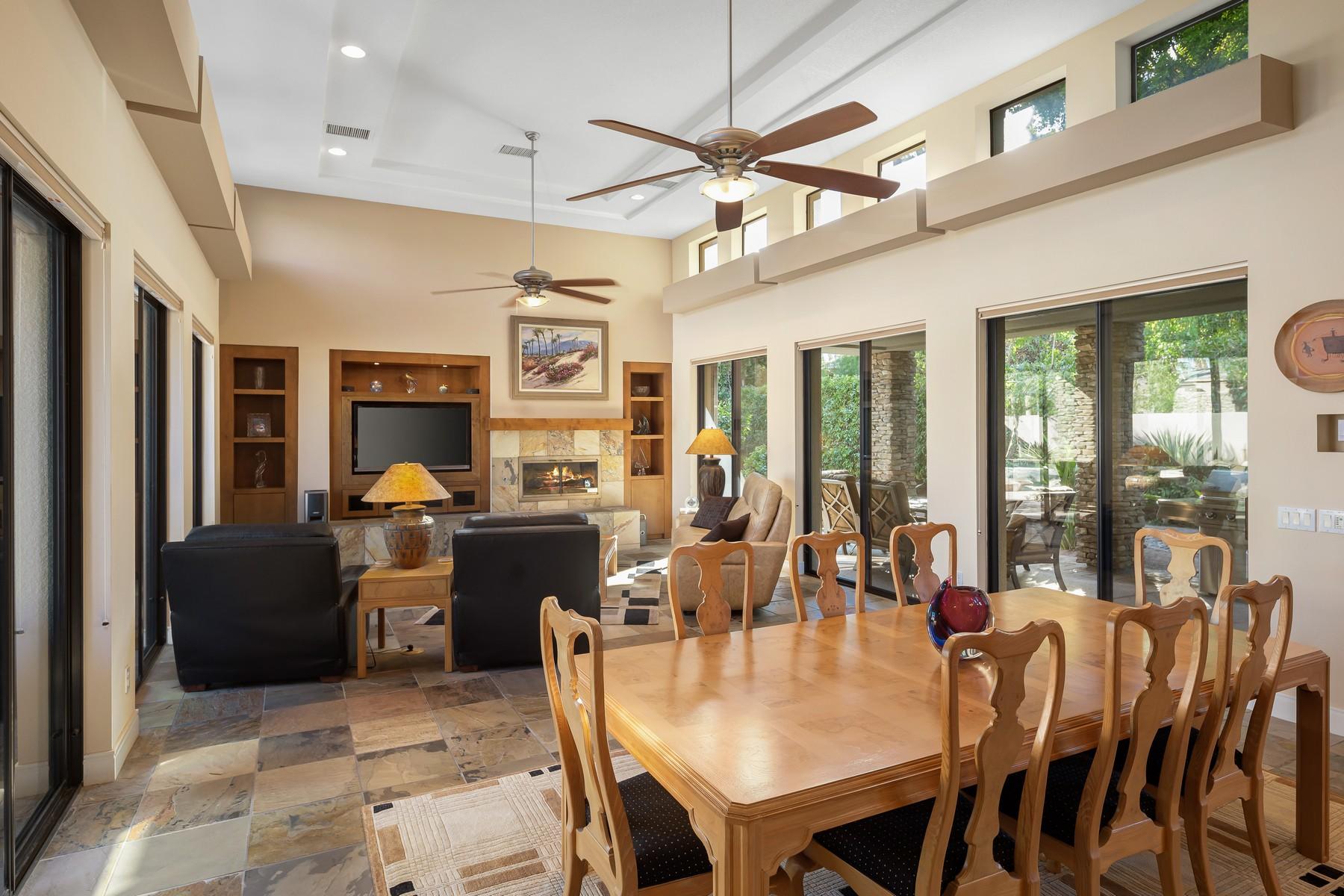 12 Dominion Court Rancho Mirage, CA 92270 - Photo 7 of 44 a dining room with furniture a chandelier and window