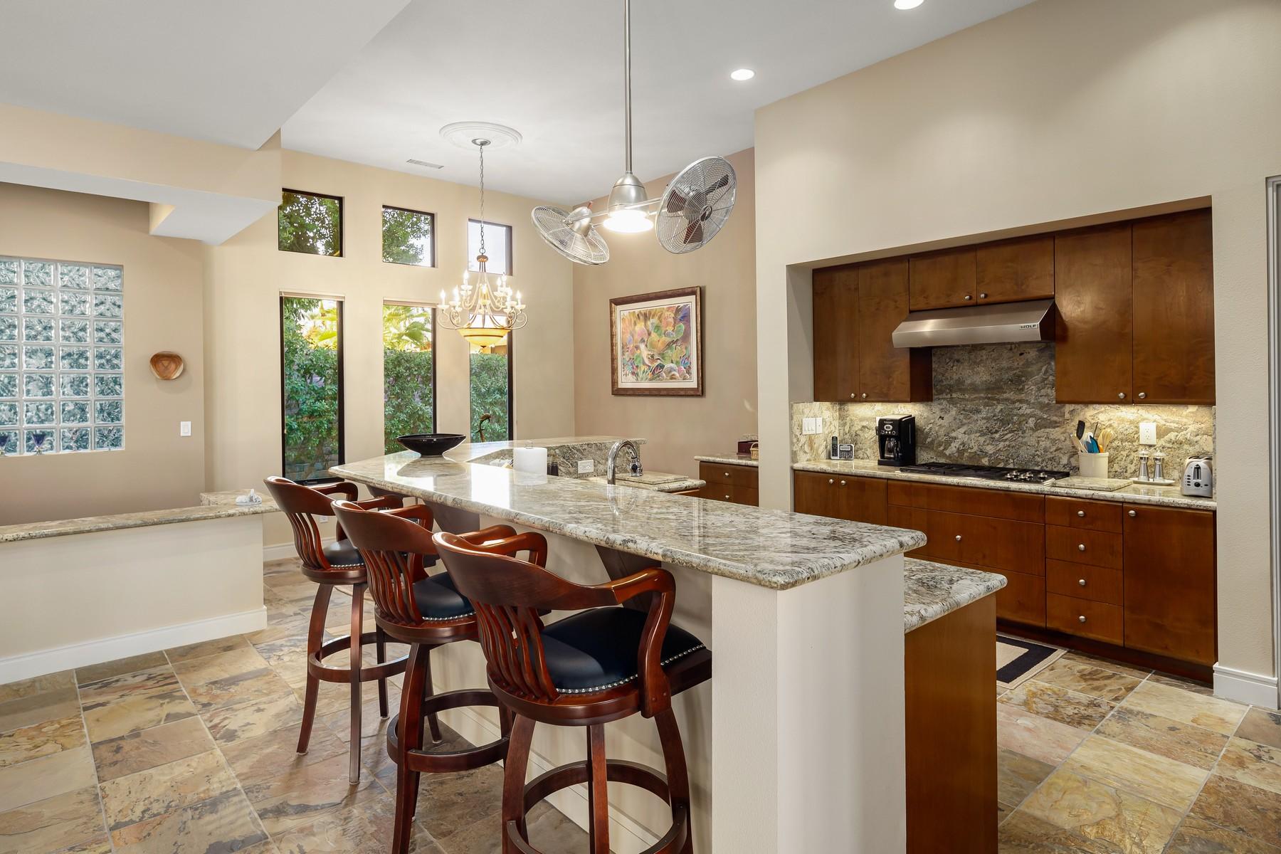 12 Dominion Court Rancho Mirage, CA 92270 - Photo 10 of 44 a view of a dining room with furniture and window