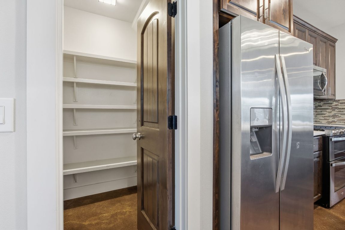 1125 Walton Lane, Unit D Austin, TX 78721 - Photo 12 of 34 a bathroom with a glass shower door and a sink