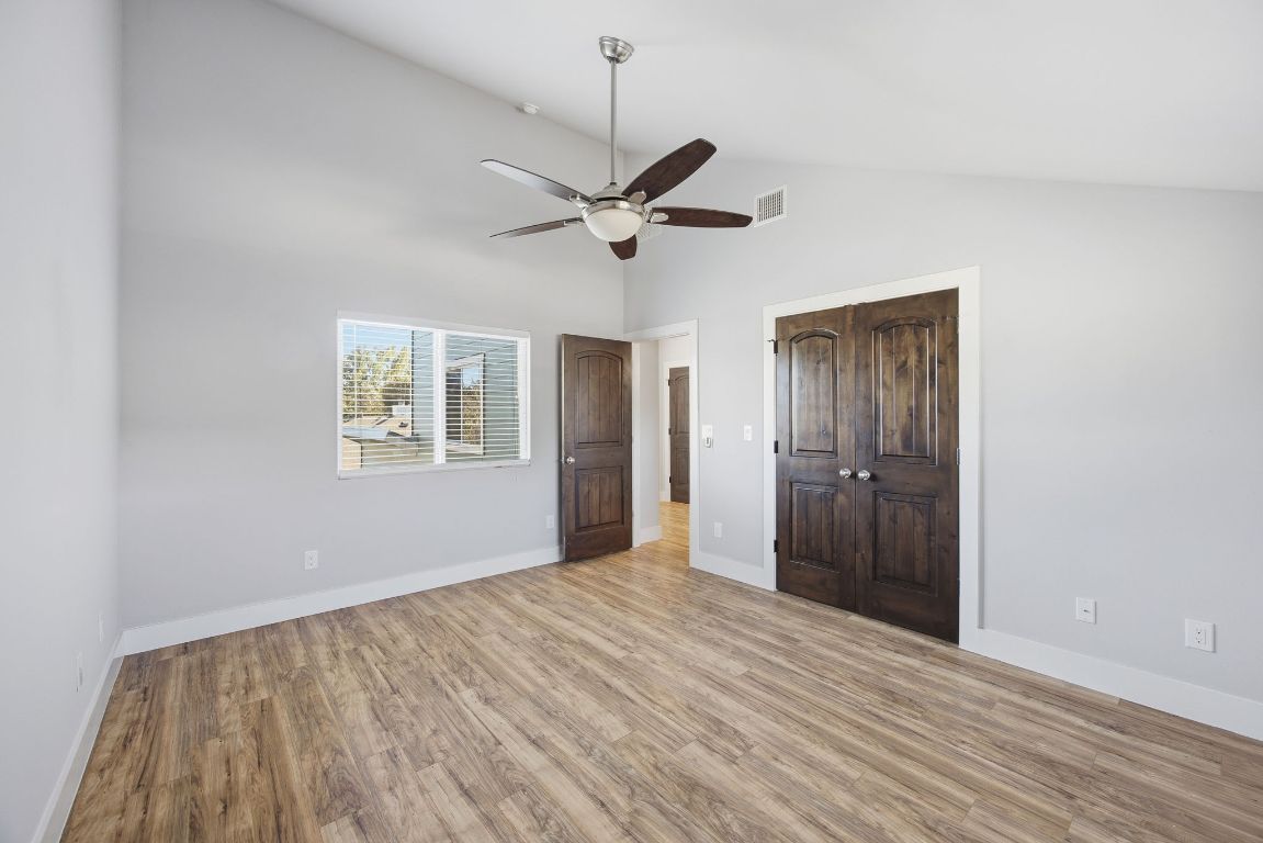 1125 Walton Lane, Unit D Austin, TX 78721 - Photo 23 of 34 a view of an empty room with a window