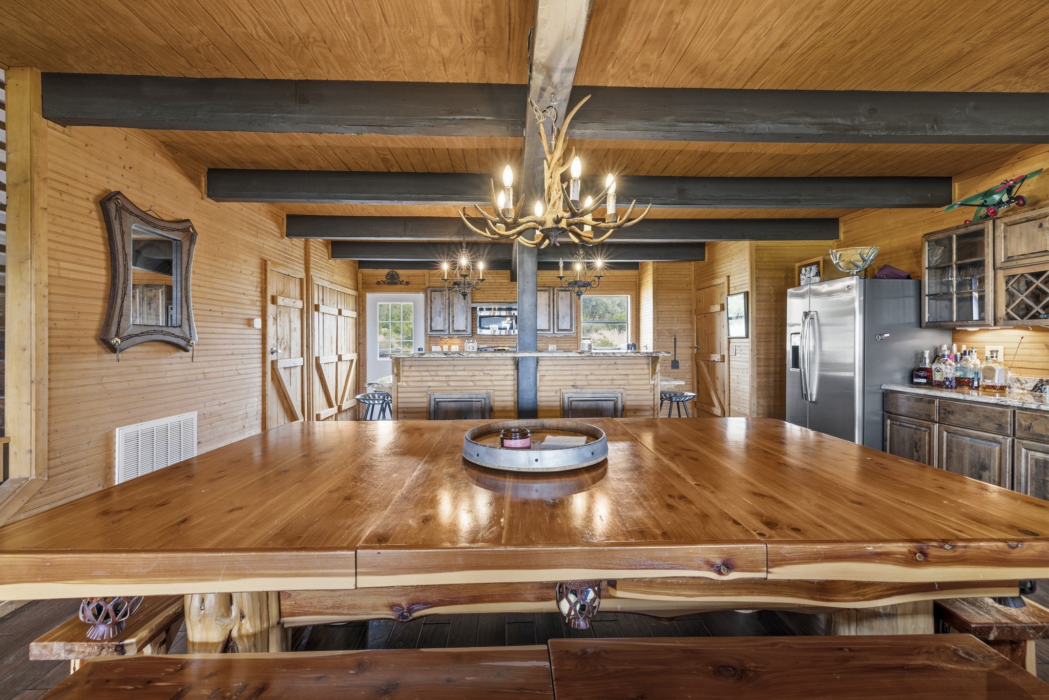 611 Weddle Road Johnson City, TX 78636 - Photo 12 of 30 a dining table with wooden floor