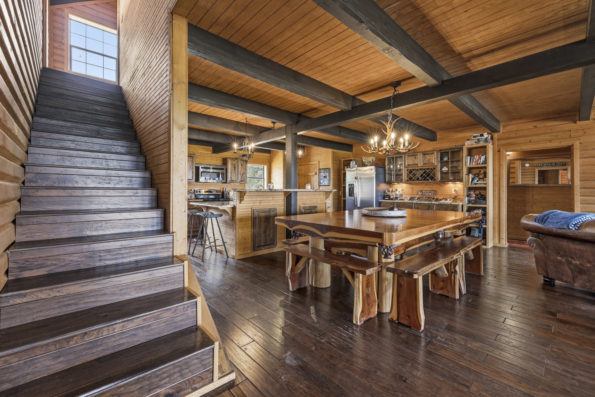 611 Weddle Road Johnson City, TX 78636 - Photo 13 of 30 a dining room with wooden floor table and chairs