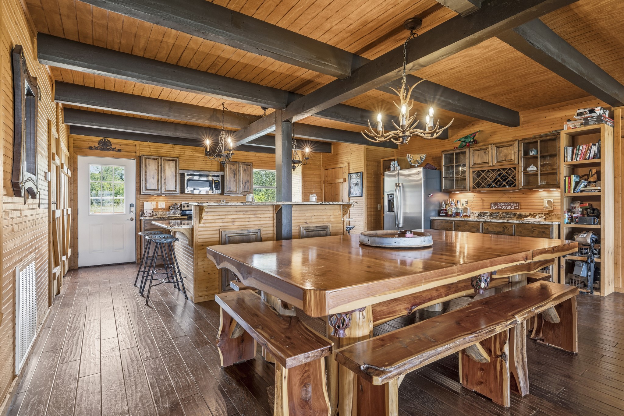 611 Weddle Road Johnson City, TX 78636 - Photo 14 of 30 a kitchen with a table and chairs in it