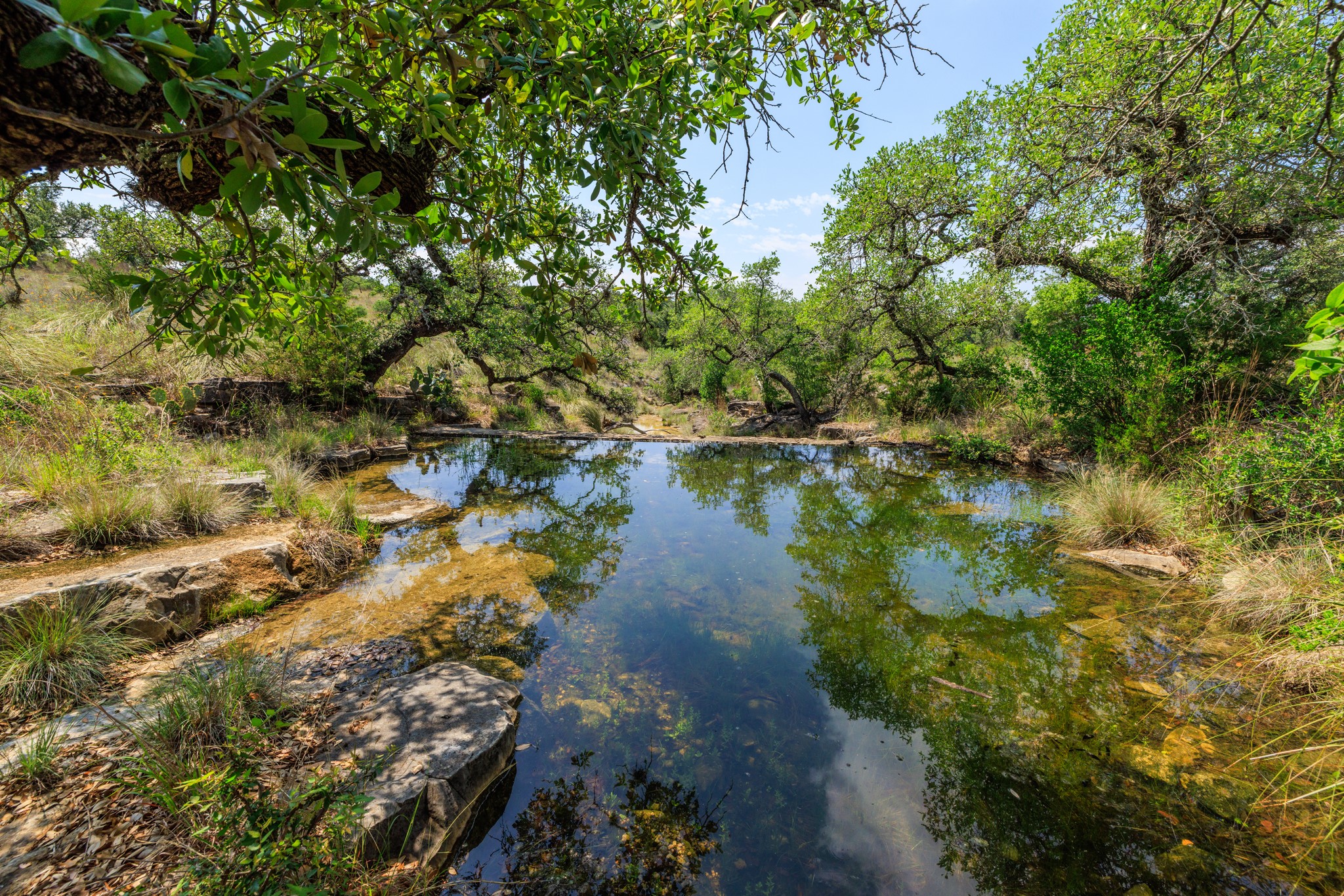611 Weddle Road Johnson City, TX 78636 - Photo 2 of 30 a view of a lake with green space