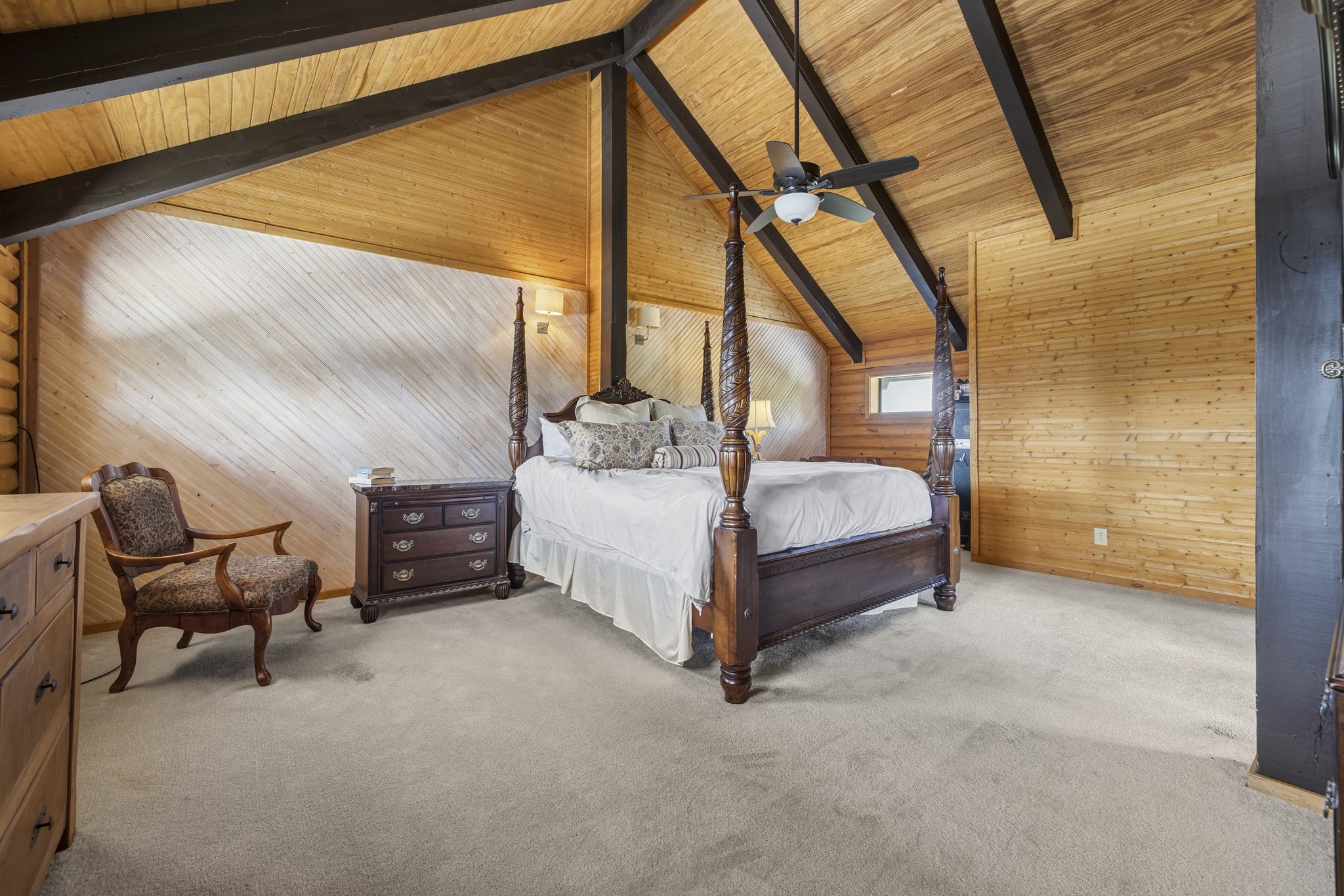 611 Weddle Road Johnson City, TX 78636 - Photo 23 of 30 a bedroom with a bed and a chair