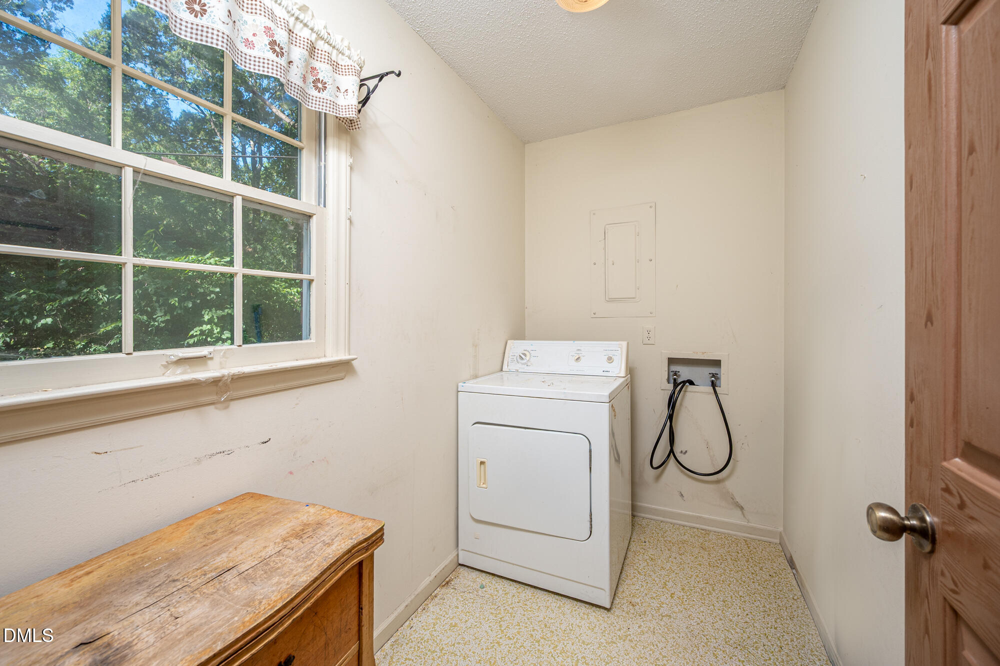 4411 Rhew Drive Durham, NC 27704 - Photo 18 of 34 a utility room with dryer and washer