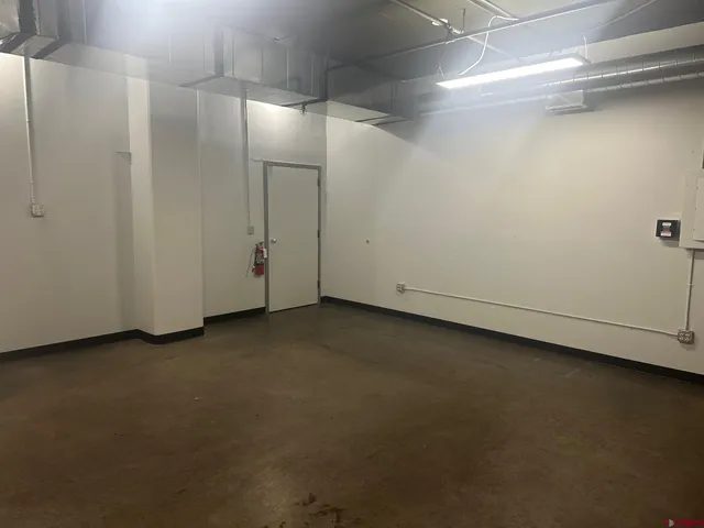 a view of a room with an empty space