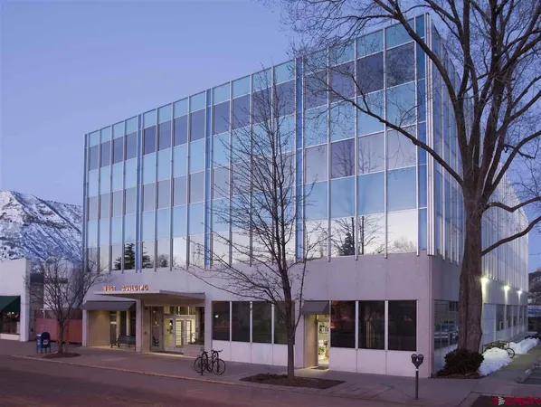 a front view of a building with street view
