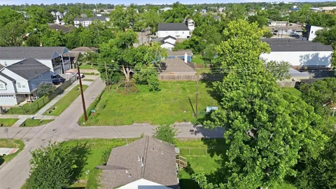 an aerial view of a house with a garden