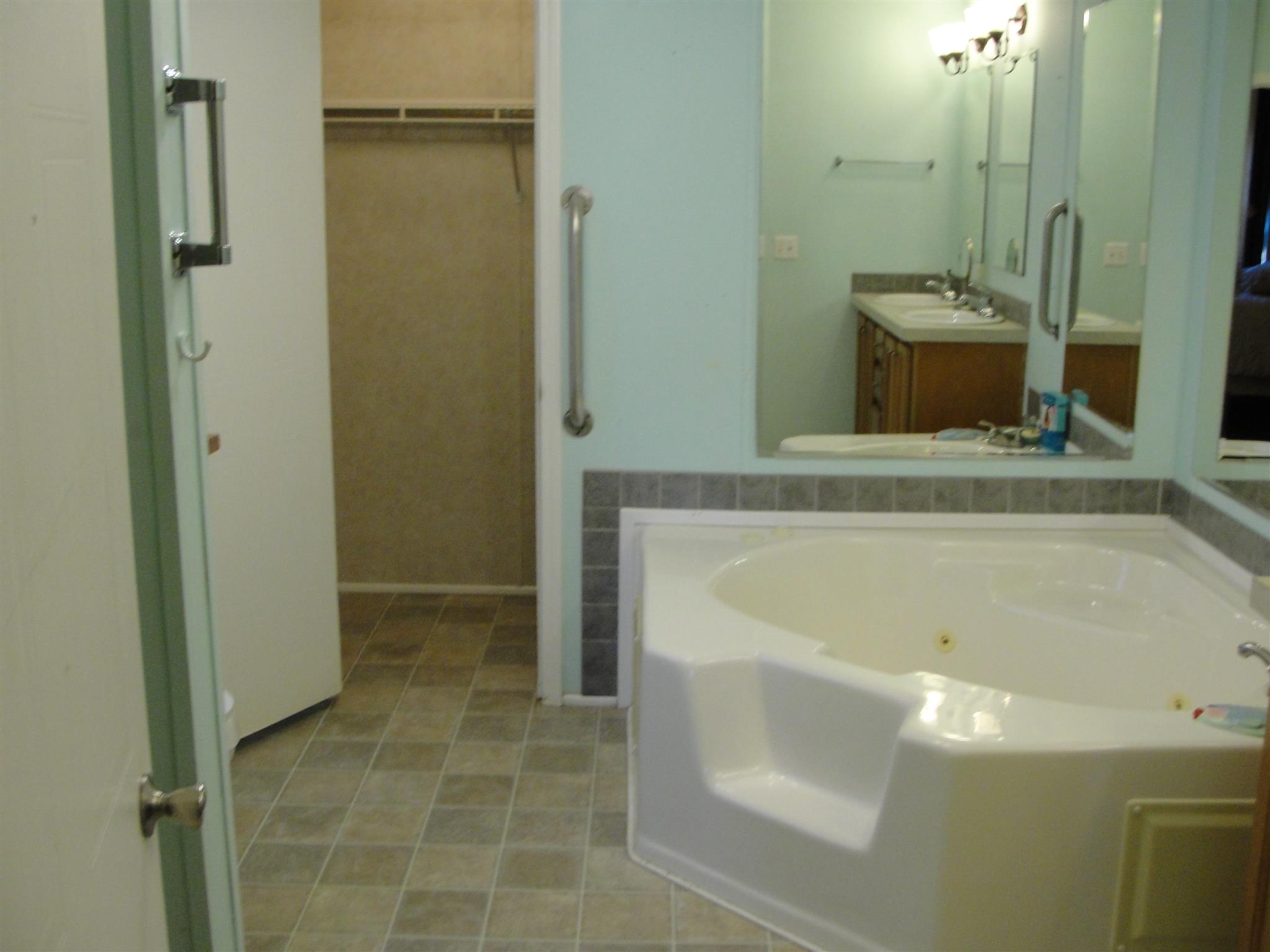 10026 Judy Road Lyles, TN 37098 - Photo 13 of 20 a bathroom with a tub