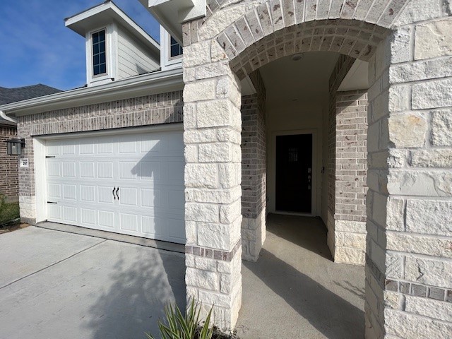 26711 Grandiflora Drive Magnolia, TX 77355 - Photo 2 of 19 a front view of a house with a garage